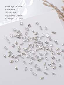 1袋100顆迷你尖底鑽石指甲藝術裝飾，超閃亮發光的DIY指甲裝飾鑽石，指甲裝飾必備 - 無色 - 查看 2