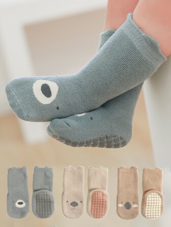 3ペアの厚みのある滑り止めフロアソックス、漫画のデザインとぬいぐるみ付き、秋/冬に歩くことを学ぶ幼児用