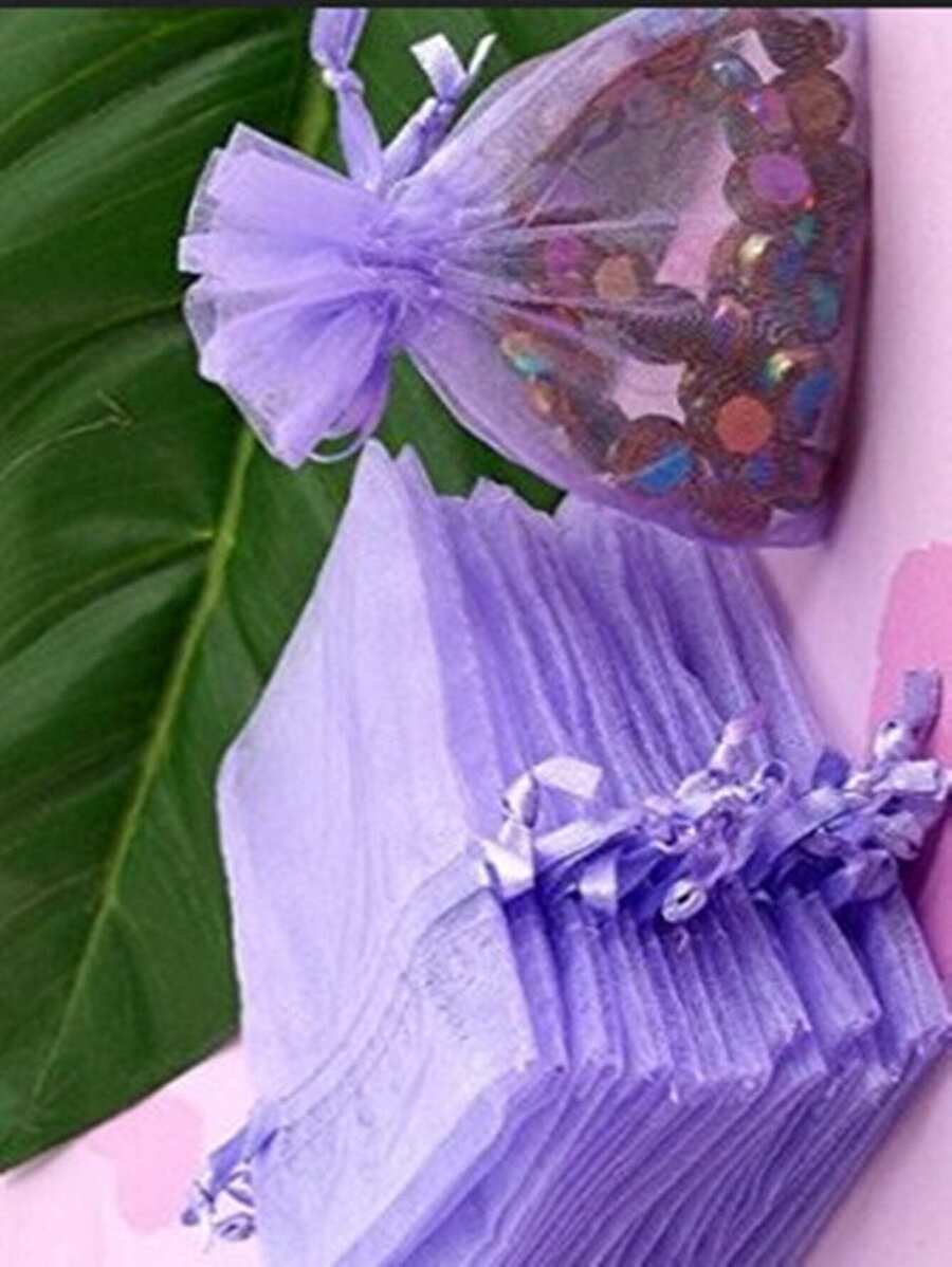 50 chiếc Túi đựng quà màu tím, Túi Organza dùng cho Halloween, Đám cưới, Tiệc, Tiệc mừng em bé chào đời, Du lịch, Tốt nghiệp, Sinh nhật, Kỷ niệm, v.v., Kích thước 9*12cm đựng trang sức, kẹo, văn phòng phẩm và các vật dụng nhỏ khác. Cũng thích hợp để trang trí, đóng gói trái cây và bảo quản chống côn trùng. Sản phẩm thủ công có thể có sai lệch nhỏ về kích thước. Sức chứa tương đương với một quả trứng gà. Nhiều màu sắc cho các dịp tiệc tùng và ăn uống. - Màu tím  Violet - Xem 1