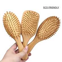 帶增強式通風口和小滾輪設計的木質坐墊刷，提供更好的梳理髮絲和頭部按摩體驗。 - 黃色 - 查看 4