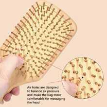 帶增強式通風口和小滾輪設計的木質坐墊刷，提供更好的梳理髮絲和頭部按摩體驗。 - 黃色 - 查看 10
