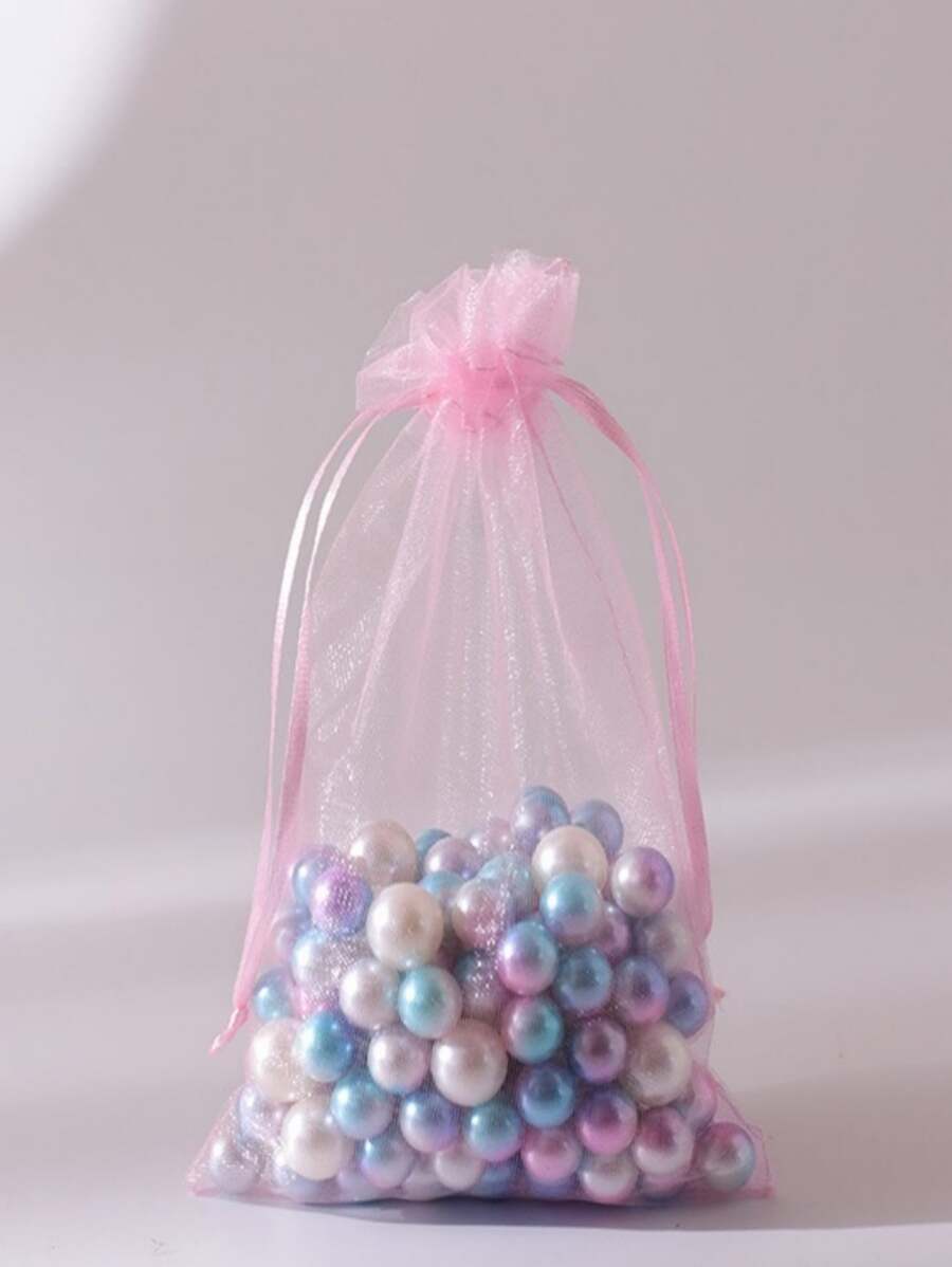 50个浅粉色礼品包装袋欧根纱袋，适用于万圣节、圣诞节、婚礼、毕业典礼、生日、周年纪念、迎婴派对等。尺寸：9*12厘米，适用于珠宝、糖果、旅行、纪念品、装饰、水果保护等，圣诞节情人节 - 淺粉色 - 查看 1