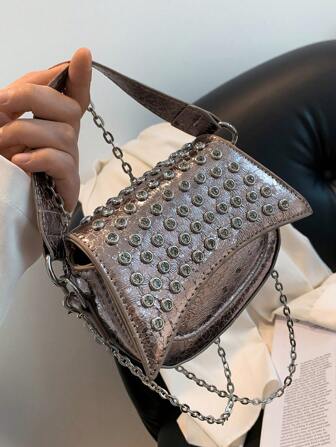 新款女性鉚釘時尚肩膀斜挎包休閒腋窩小後背包流行