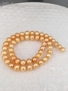 一鋼絞線9-10mm橘色淡水珍珠38.5cm珠子適用於項鍊或者手鍊製作女性日常生活隨機發貨