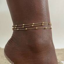 MONALLY Tobillera de cadena de bolas multicapa con baño de oro de 18K, de material de acero inoxidable, adecuada para que las mujeres la usen en vacaciones de verano, viajes, playa y fiestas - Amarillo Oro - Ver 12
