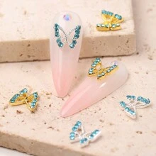 10 件金色和银色蝴蝶形金属美甲耳钉，配蓝色水钻