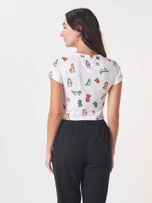 PLAYERA HOMBLIGERA CON ESTAMPADO DE DINOSAURIOS TE AMOMO - Blanco - Ver 6