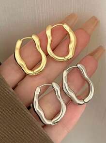 1 Paar asymmetrische, einfache, geometrische Ohrclips in Silberfarbe, geeignet für den täglichen Gebrauch von Frauen