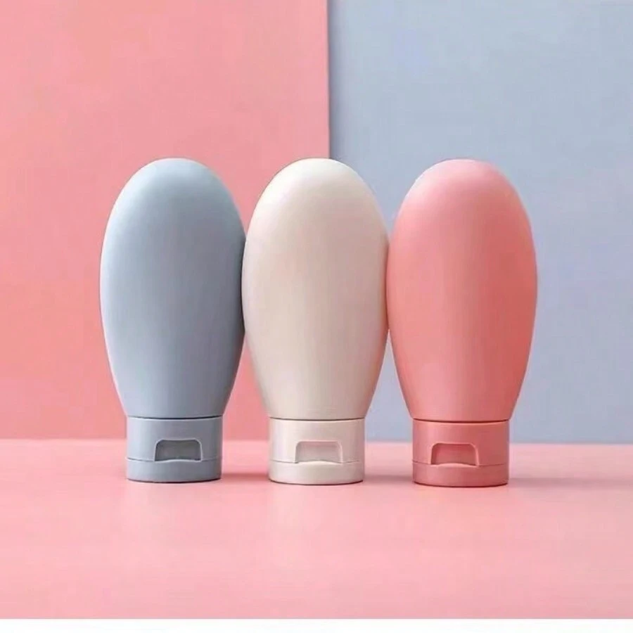 1 / 3入組裝可再填充矽膠旅行瓶套裝，防漏且可擠壓，適用於洗髮精、乳液和盥洗用品，非常適合隨身攜帶和外出使用。矽膠乳液瓶 - 粉色 - 查看 1