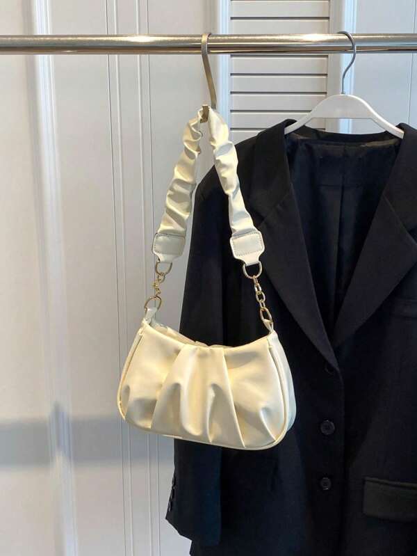 Nueva bolsa de nube de hombro plisada negra y simple de moda retro para el transporte