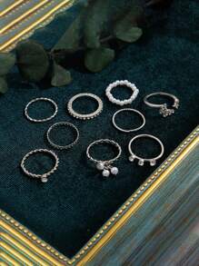 9入組隨機時尚蝴蝶設計接骨指環套組,鑲有鑽石和人造珍珠裝飾,適合女性日常佩戴