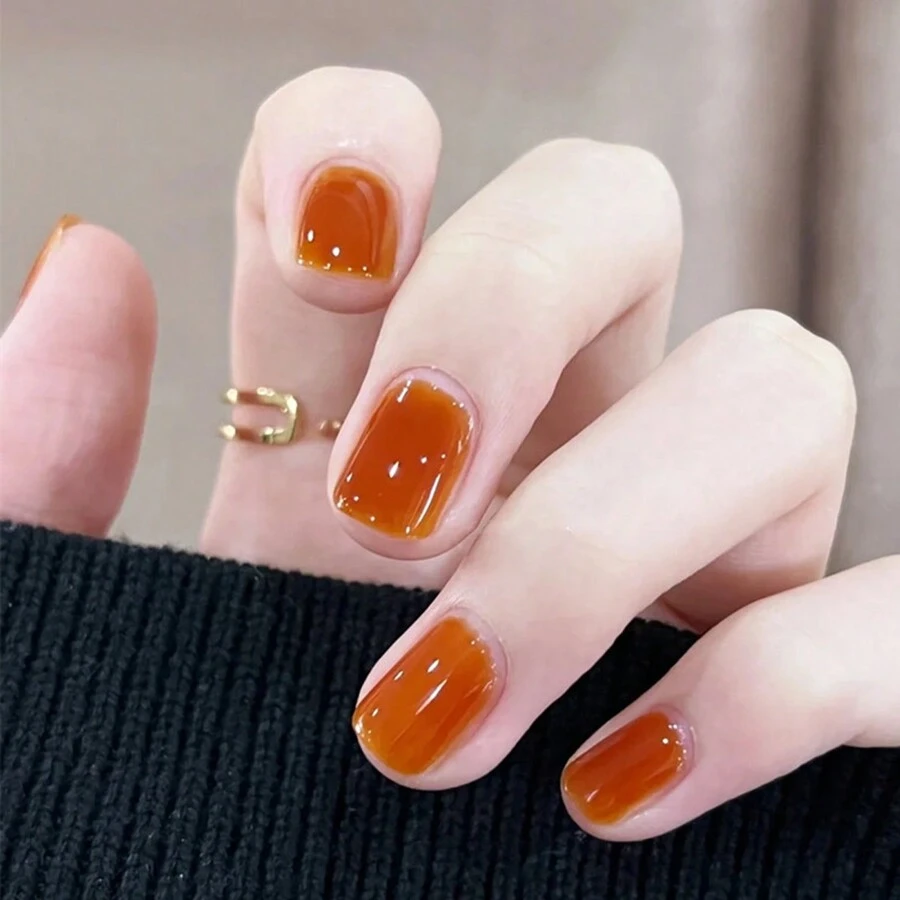 24入組短橢圓形橙色假指甲，含1支指甲檔和果凍膠，適用於派對、舞蹈和日常穿戴的壓克力指甲提供商 - 橘色 - 查看 1