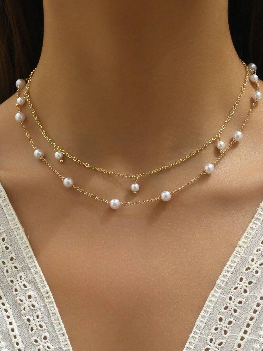 2 chiếc vòng cổ mặt thánh giá và ngọc trai giả cho nữ (Số lượng ngọc trai là ngẫu nhiên) - Vàng - Xem 1