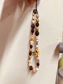 可愛女孩魚骨形手工串珠手機鏈、腕帶、短款創意手持掛繩、新款相機裝飾、時尚耳機保護挂件 - 棕色 - 查看 1