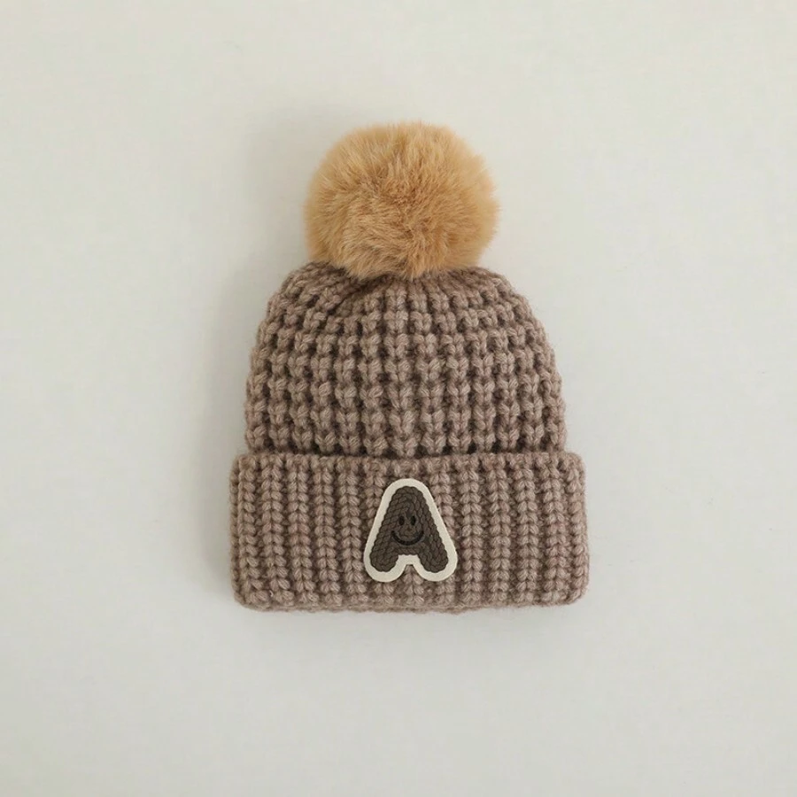 1 件兒童帽子帶卡通徽標、笑臉、字母和絨球,保暖針織帽適合秋冬戶外活動,年齡 3-8 歲