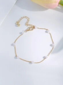 Un bracelet élégant en imitation perle parfait pour un usage quotidien