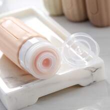 Bộ 4 chai đựng đồ dùng vệ sinh cá nhân du lịch, hộp đựng đồ dùng vệ sinh cá nhân được TSA chấp thuận mang lên máy bay, ống silicon mềm dẻo chống rò rỉ 3 ounce, phụ kiện du lịch có thể tái sử dụng cho dầu gội, sữa tắm. - Nhiều màu - Xem 2