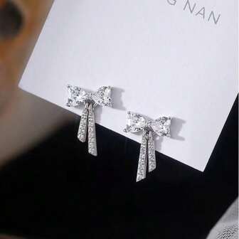 Top-Grade Celebrity Design, High-End Feel, S925 Sterling Silver, Classic Large Zirconia Bow Tassel Earrings, Ideal Gift For Family, Friends, And Couples