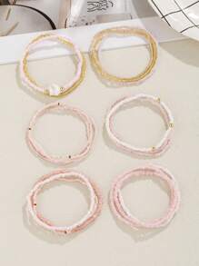 Conjunto de 17 brazalete apilable estilo bohemio con cuentas de vidrio y semillas en tono rosa para mujeres