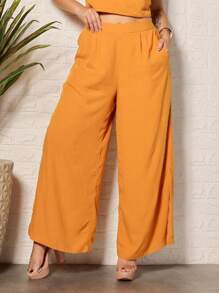 Calça pantalona abertura lateral elastico