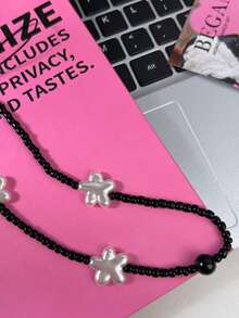 1入組亞加力星星裝飾的千禧風格手機掛繩,適合女性日常手機配飾 - 黑與白 - 查看 2