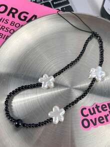 1入組亞加力星星裝飾的千禧風格手機掛繩,適合女性日常手機配飾 - 黑與白 - 查看 4