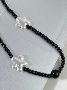 1入組亞加力星星裝飾的千禧風格手機掛繩,適合女性日常手機配飾 - 黑與白 - 查看 5