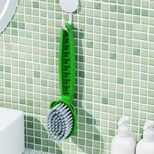 1只可愛的卡通蛙形柔性毛刷和鞋子清潔工具