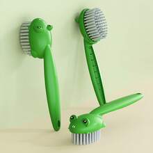 1只可愛的卡通蛙形柔性毛刷和鞋子清潔工具