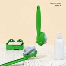 1只可愛的卡通蛙形柔性毛刷和鞋子清潔工具