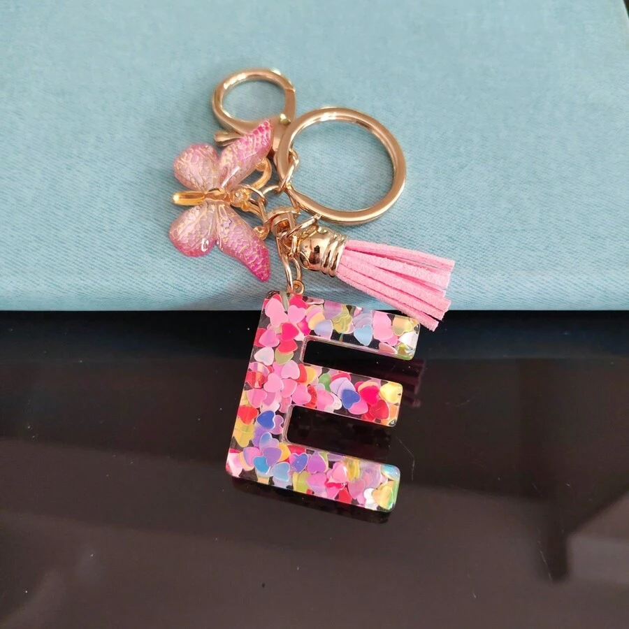 1入閃亮樹脂首字母蝴蝶結鑰匙扣女性,適用於鑰匙/包的時尚配飾 - 粉色 - 查看 1