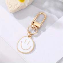 1Pc Hợp kim tráng men sơn mặt cười Móc khóa biểu cảm bất đối xứng màu vàng Móc khóa túi phụ kiện mặt dây chuyền - 1 cái - Xem 2