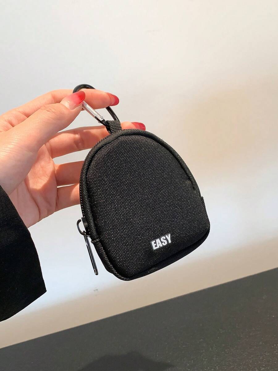 Una bolsa elegante y linda hecha de tela de poliéster adecuada para usar como llavero o colgante para hombres y mujeres, de moda y ligera, ideal como regalo de aniversario, cumpleaños o para trabajadores de cuello blanco, tanto para hombres como para mujeres. También puede usarse como cartera, llavero, mini cartera, monedero o bolsa de cambio. - Negro - Ver 1