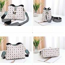 2023互聯網時尚單肩包女性新款廣闊肩膀水桶包帶大容量蝴蝶金屬裝飾用品包適合女士在工作場所生日禮物適合女士