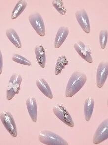 Sanrio 情人节指甲 24 件中长杏仁形假指甲，带蓝紫银银河闪亮星星和白色水钻装饰，另加 1 件果冻凝胶和 1 件指甲锉，适用于女孩按压指甲美甲用品