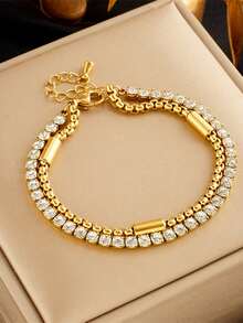 Một chiếc vòng tay hai lớp bằng thép không gỉ cao cấp, được đính đầy đá quý lấp lánh, thiết kế dành riêng cho phái nữ, là món quà hoàn hảo cho các dịp lễ và sinh nhật. - Vàng - Xem 1