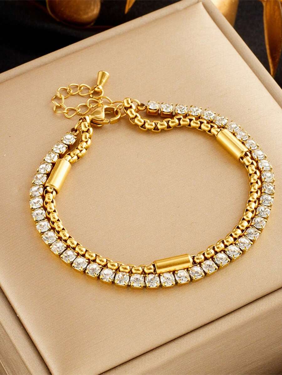 Một chiếc vòng tay hai lớp bằng thép không gỉ cao cấp, được đính đầy đá quý lấp lánh, thiết kế dành riêng cho phái nữ, là món quà hoàn hảo cho các dịp lễ và sinh nhật. - Vàng - Xem 1