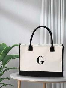 字母圖形單肩手提包大容量書包適合畢業生、青少年女孩、新生、大二、初中和高中大學生、大學和高中，非常適合戶外、旅行和返校防水尼龍斜挎包，休閒字母貼佈裝飾單肩包女士時尚拉鍊錢包 - 黑與白 - 查看 4