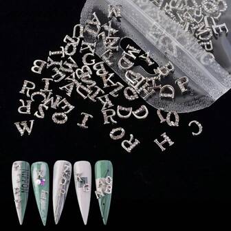 26 piezas/paquete Decoraciones de arte de uñas con alfabeto inglés de aleación de fondo plano plateado y pedrería, decoraciones de uñas DIY, encantos de uñas, para suministros de uñas decoración uñas