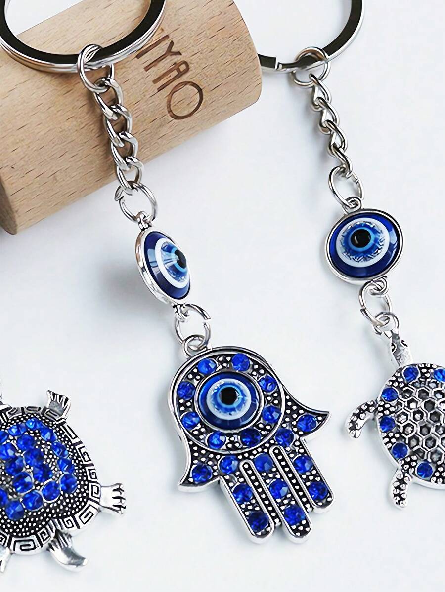 袋子吊飾土耳其希臘藍眼睛金屬鑰匙扣hamsa手邪惡的眼珠首飾歐美新款邪惡的眼珠袋掛鑰匙扣藍眼睛鑰匙扣吊墜合金珠寶背包吊墜手鑰匙包扣鑰匙圈汽車袋吊墜 - 寶藍色 - 查看 1