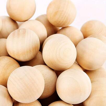 A Bag Of Hardwood Balls, Many Unfinished Round Wooden Ball Bags, Using Natural wood, Small Marble-sized Balls, Used For Crafts And DIY Projects, And A Variety Of Rulers Are Available.