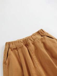 (水洗痕在褲子左口袋)男孩休閒時尚寬鬆牛仔胡蘿蔔褲爸爸褲秋季