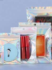 50 piezas Bolsa de regalo con diseño láser reflectante, bolsas reutilizables de varios tamaños con diseño de arcoíris láser, adecuadas para bolsas de dulces para pequeños negocios y bolsas con cierre automático para exhibir muestras, bolsas de regalo navideñas