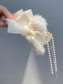 1入秋冬時節用於女性的流蘇&蝴蝶結髮夾，大號髮夾，髮爪