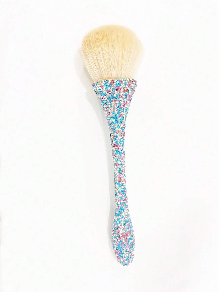 Una Brocha De Maquillaje Cubierta Con Pedrería Brillante - Azul - Ver 1