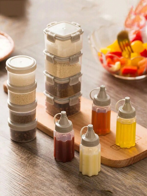 4 pièces Mini bouteilles de sauce portables pour le miel, la sauce tomate, la vinaigrette avec une caractéristique d'utilisation unique et jetable. Idéal pour la cuisine, les cadeaux de Noël, les fournitures scolaires.