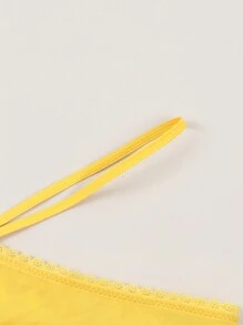 女性性感肩帶蝴蝶結和鑽石裝飾丁字褲