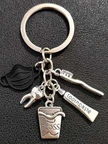 1 pieza Llavero de dentista con combinación de máscara, pasta de dientes y cepillo de dientes, accesorio colgante para bolso, llavero y accesorios de coche - Negro - Ver 4