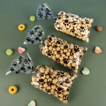50/100 件狗爪印禮品袋、餅乾/糖果袋、帶爪印的玻璃紙零食袋、帶麻線領帶的粘合密封袋、非常適合寵物零食、派對禮物、禮物、黑色、適合所有場合