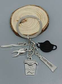 1 pieza Llavero de dentista con combinación de máscara, pasta de dientes y cepillo de dientes, accesorio colgante para bolso, llavero y accesorios de coche - Negro - Ver 2